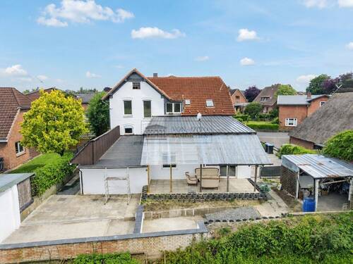 Außenansicht - Mehrfamilienhaus, Wohnhaus in Hohenaspe