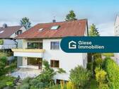 Titelbild mit Banner - Vielseitiges 2-Familienhaus in toller Lage