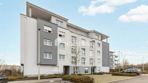 Außenansicht 1 - Großzügige Erdgeschosswohnung mit Terrasse, Garten und Tiefgaragenstellplatz in ruhiger Lage