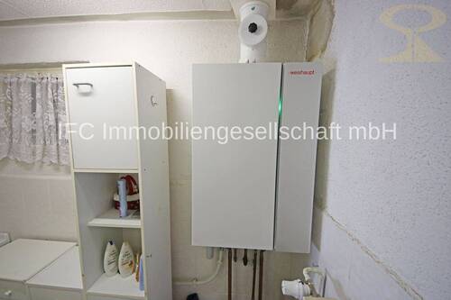 Bad mit Brennwerttherme im EG - 