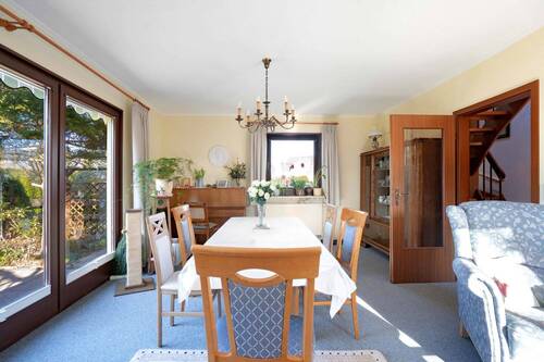 Wohnzimmer mit Essbereich - Einfamilienhaus mit 105,00 m&sup2; in Rukieten zum Kaufen