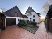 Hofbereich - Mehrfamilienhaus, Wohnhaus mit 175,00 m&sup2; in Lage zum Kaufen