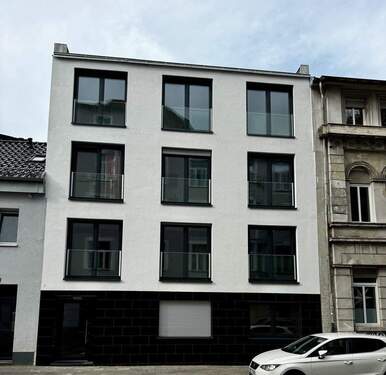 Strassenansicht - Schickes Apartment mit Terasse Alt Mülheim Neubau