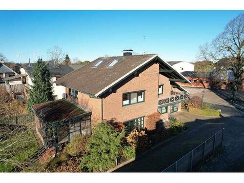 Seitenansicht - 5 Zimmer Mehrfamilienhaus, Wohnhaus in Timmaspe