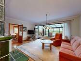 Wohnzimmer mit Ausgang zum Wintergarten im Erdgeschoss - Einfamilienhaus mit 158,00 m&sup2; in Ostseeheilbad Zingst zum Kaufen