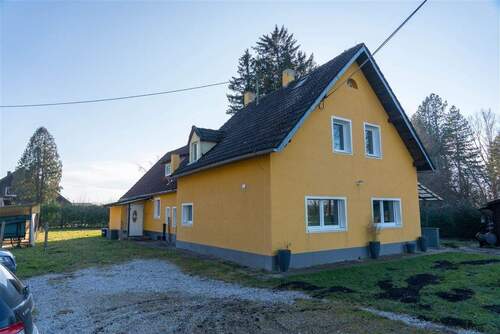 Vorderansicht - Mehrfamilienhaus, Wohnhaus mit 192,00 m&sup2; in Gröbenzell zum Kaufen