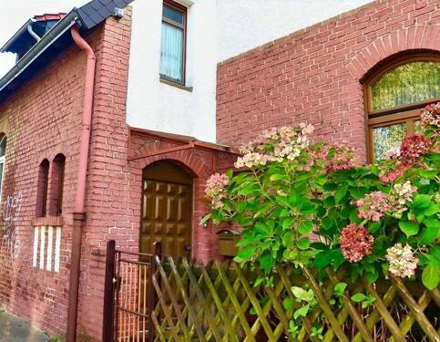 Hauseingang - Reihenmittelhaus mit 93,00 m² in Düsseldorf zum Kaufen