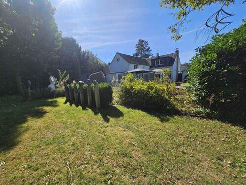 Haus- und Gartenansicht - Einfamilienhaus mit 202,00 m&sup2; in Solingen zum Kaufen