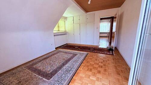 Zimmer im Dachgeschoss - 