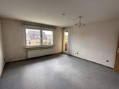Wohnzimmer mit Zugang Balkon - Etagenwohnung mit 64,00 m² in Celle zum Kaufen