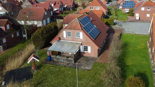 Luftbild - 4 Zimmer Einfamilienhaus zum Kaufen in Dornum