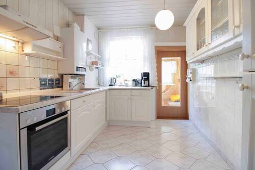 Küche mit Einbauküche EG - Reihenendhaus mit 128,30 m&sup2; in Friedland zum Kaufen