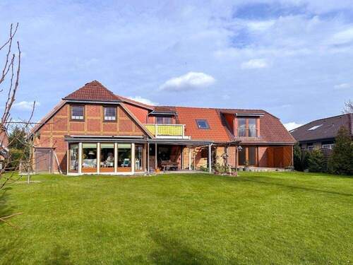 14311 LooseImmo Ansicht hintenitel - 1 Zimmer Mehrfamilienhaus, Wohnhaus zum Kaufen in Bad Schwartau / Rensefeld