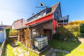 Garage und Holzlager zur EG Whg - 