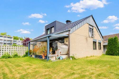 Kräheninkel 5_Außenansicht Garten - 5 Zimmer Einfamilienhaus zum Kaufen in Bielefeld