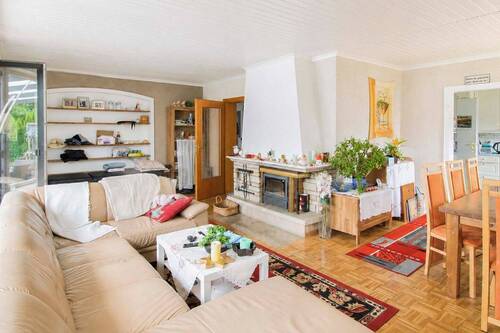 Krähenwinkel 5 Wohnzimmer mit Kamin und Zugang zum Garten - 5 Zimmer Einfamilienhaus in Bielefeld