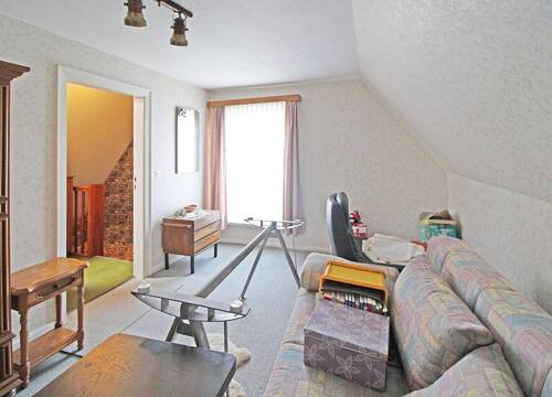 Zimmer im Dachgeschoss - 