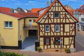 Seitenansicht - Mehrfamilienhaus mit 3 WE + 1 GE, Ausbaupotenzial in gefragter Lage Groß-Zimmern
