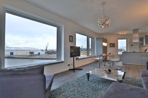 gemütlicher Wohnbereich mit Blick auf das Meer - 