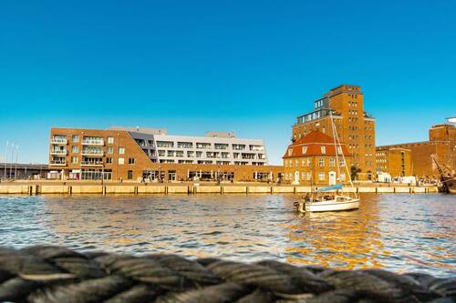 Blick auf das Apartmenthaus - Etagenwohnung mit 99,40 m&sup2; in Wismar zum Kaufen
