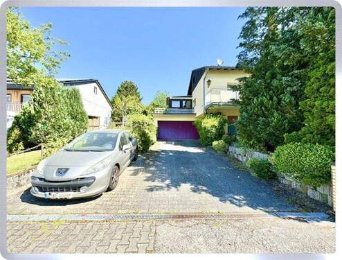 Zufahrt Garage + Stellplatz - 