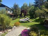 Blick in den Garten - 3 Zimmer Etagenwohnung zum Kaufen in Murnau am Staffelsee