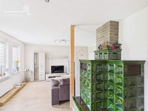 Wohnzimmer mit Kachelofen - 