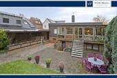 Bild 1 - ***Bungalow mit separaten Gewerbeanteil *** Möglichkeiten zur Erweiterung der Wohnfläche vorhanden ***