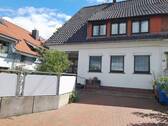 Ansicht Straße - Wohnen in Brake direkt an der Weser - mit unverbaubarem Traumblick