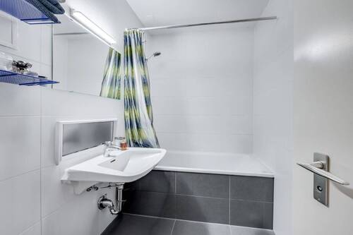 Badezimmer - Etagenwohnung mit 71,80 m&sup2; in München zum Kaufen