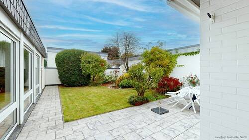 Gartenansicht mit Terrasse - Provisionsfrei für Käufer: Einfamilienhaus mit Garage für Paare & Familien in Hamm-Westtünen