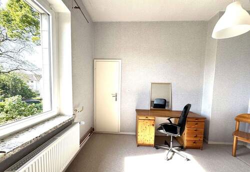 1 OG links Zimmer - 