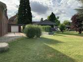 Gartenansicht mit Bungalow - Mehrfamilienhaus, Wohnhaus in Ahlen zum Kaufen