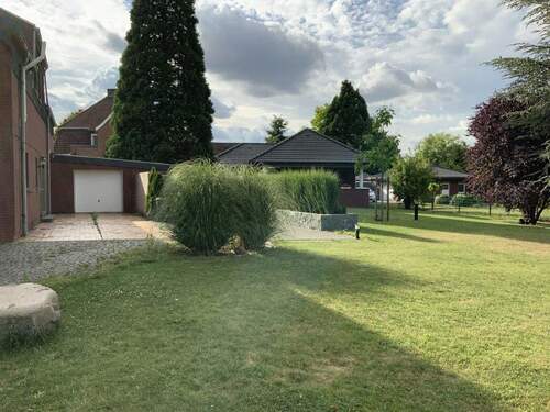 Gartenansicht mit Bungalow - Mehrfamilienhaus, Wohnhaus in Ahlen zum Kaufen