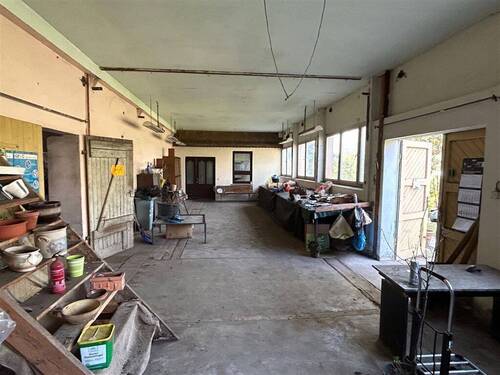 Werkstatt mit Blick zum Büro und Ausgang Gartentei - 