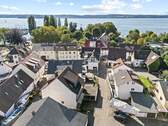 Luftaufnahme in Richtung Hafen und Bodensee - 1 Zimmer Mehrfamilienhaus, Wohnhaus zum Kaufen in Uhldingen-Mühlhofen