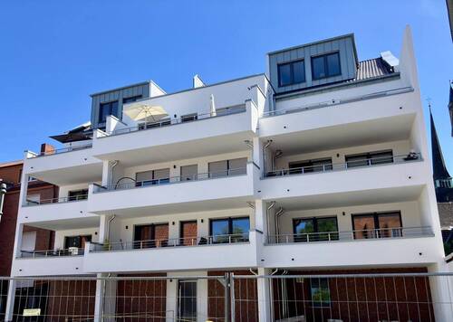 Hinteransicht Wohn-/ Geschäftshaus - 3 Zimmer Terrassenwohnung in Ahlen
