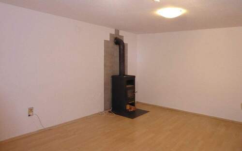 Kachelofen im Wohnzimmer ELW - 