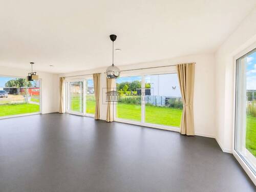 Wohnzimmer - 5 Zimmer Mehrfamilienhaus, Wohnhaus zum Kaufen in Messenkamp