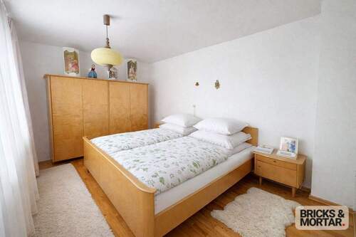 Schlafzimmer 1 Obergeschoss - Einfamilienhaus mit 143,60 m&sup2; in Langenneufnach zum Kaufen