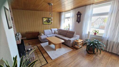 Wohnzimmer EG - Mehrfamilienhaus, Wohnhaus mit 185,00 m&sup2; in Grasleben zum Kaufen