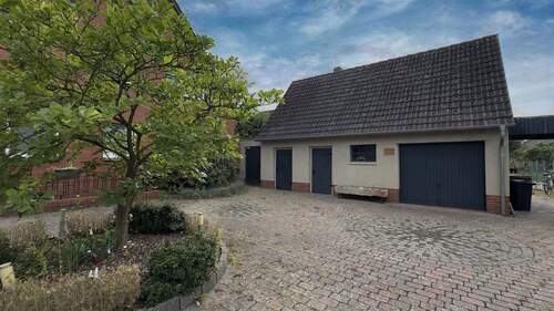 Garagen - Einfamilienhaus mit 147,00 m&sup2; in Barnstorf zum Kaufen