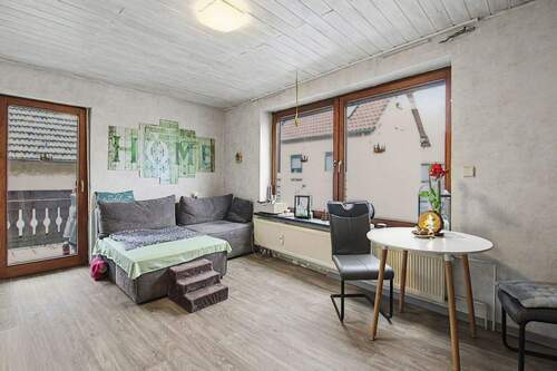 Wohnzimmer OG - MFH mit 2 Einheiten und Wertsteigerungspotenzial in Lich-Bettenhausen zur flexiblen Nutzung