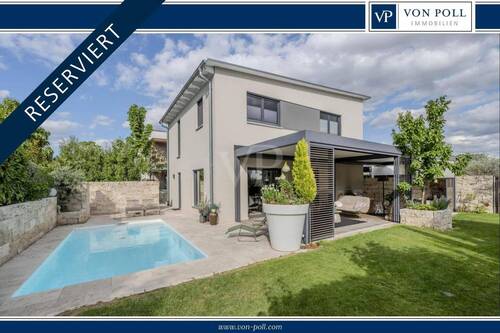 Hausansicht mit Garten - Nachhaltigkeit und Luxus vereint - Ihr neues Zuhause in Wolfschlugen