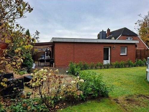 Ansicht Anbauwohnung - Mehrfamilienhaus, Wohnhaus mit 185,00 m&sup2; in Leer zum Kaufen