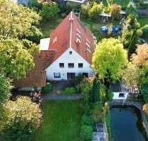 Charmantes Ein-Zweifamilienhaus mit großem Grundstück, eigenem Schwimmteich und genug Platz für zwei Familien - Ganderkesee