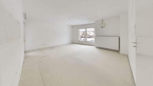  Wohnzimmer_Blick_aus_Ecke - 