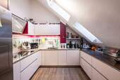 Die_Kueche - Etagenwohnung mit 119,30 m&sup2; in Olching zum Kaufen