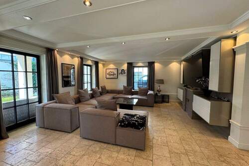 Blick auf den Wohnbereich - Einfamilienhaus mit 203,00 m² in München zum Kaufen