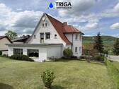 Ansicht vom Garten - Einfamilienhaus im Villencharakter mit Garage und gepflegtem Garten!